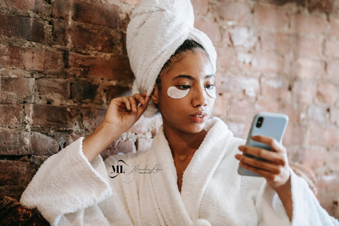 Woman wearing eye patches - ML Delicate Beauty